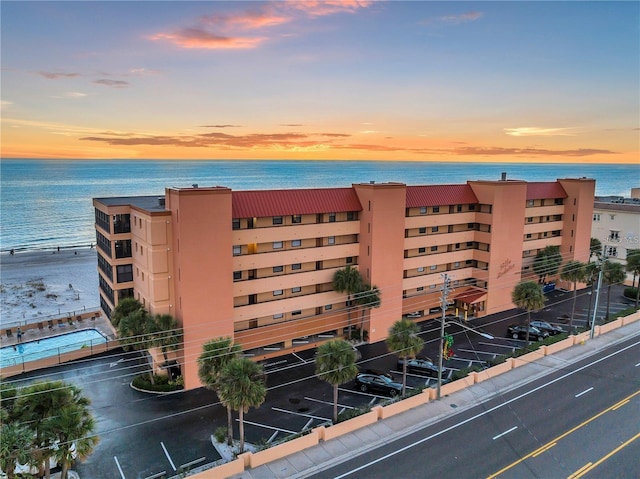 outdoor building at dusk with a water view