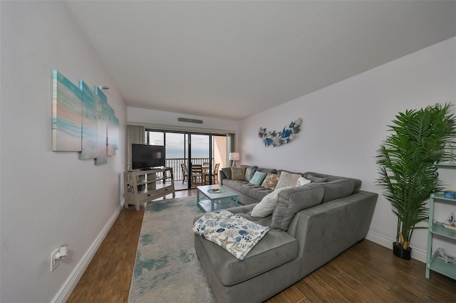 living room with dark wood-type flooring