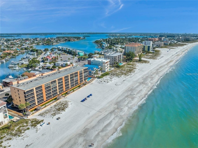 aerial view with a beach view and a water view