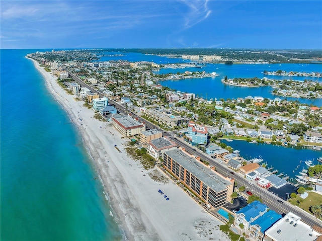 drone / aerial view with a water view and a view of the beach