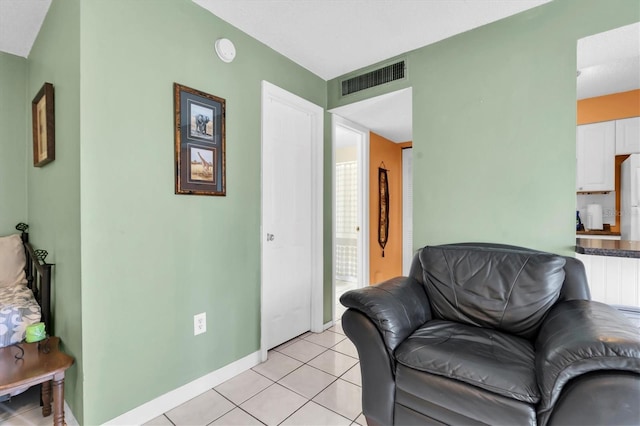 living room with light tile patterned floors