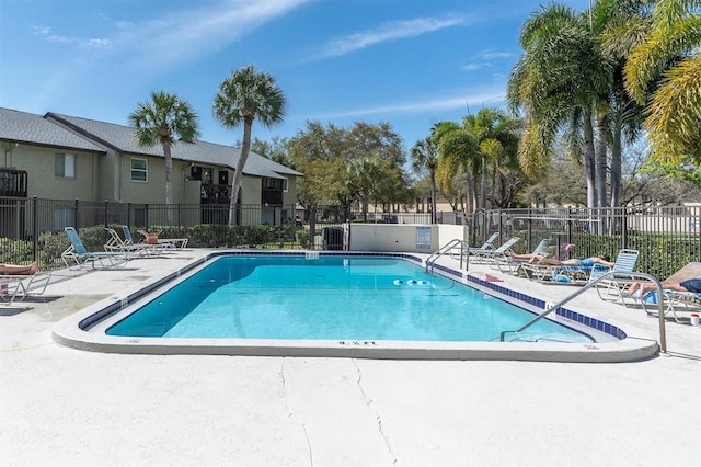 view of swimming pool with a patio