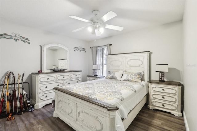 bedroom featuring ceiling fan and dark wood-type flooring