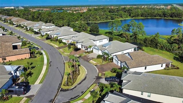 aerial perspective of suburban area with a large body of water