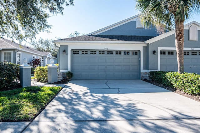 view of front of home with a garage