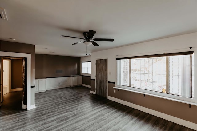 2005 E Crenshaw St, Tampa, FL 33610 - interior space with ceiling fan and dark hardwood / wood-style floors