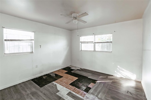 2005 E Crenshaw St, Tampa, FL 33610 - empty room with ceiling fan and wood-type flooring