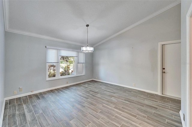 unfurnished room featuring hardwood / wood-style flooring, a textured ceiling, a notable chandelier, and crown molding