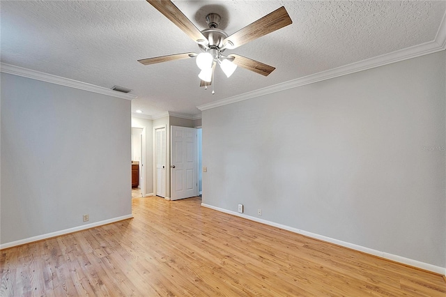 unfurnished room with a textured ceiling, ceiling fan, light hardwood / wood-style floors, and crown molding