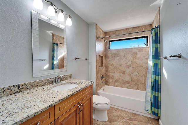 full bathroom featuring toilet, shower / tub combo with curtain, and vanity