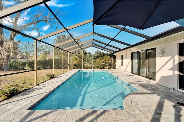 view of pool featuring a lanai and a patio area