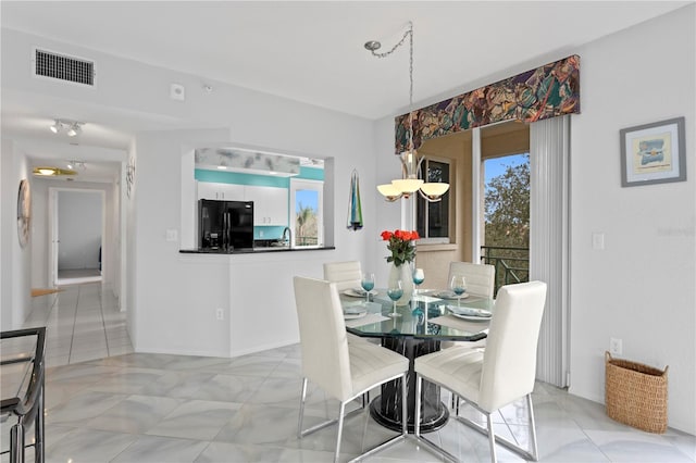 view of tiled dining area