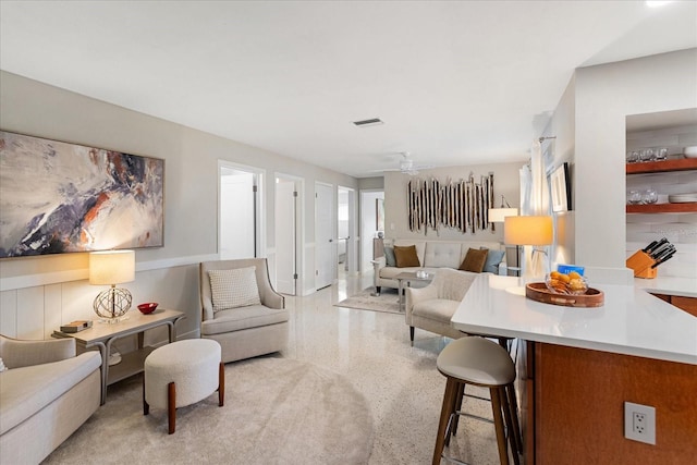 living room with ceiling fan