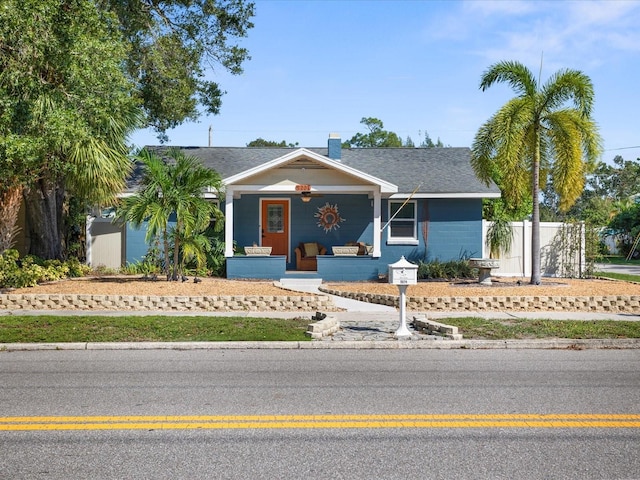 ranch-style home featuring covered porch