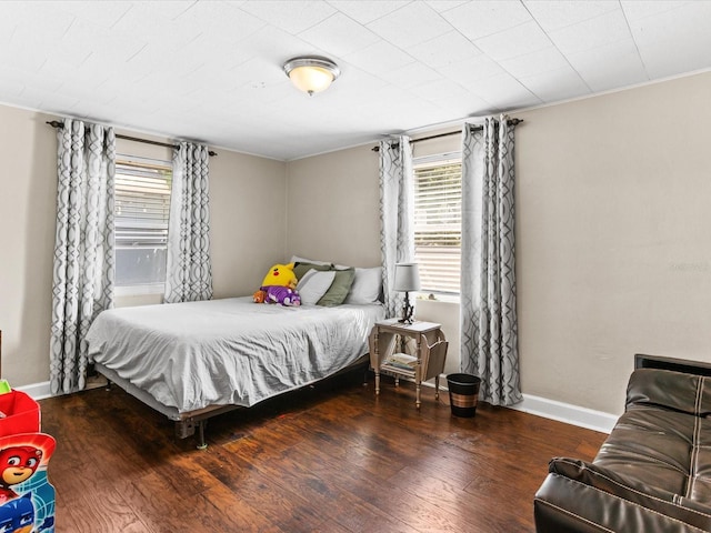 bedroom featuring dark wood-type flooring