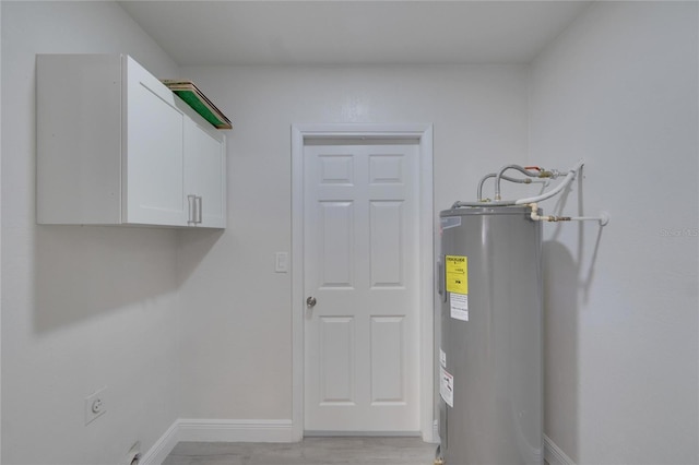 utility room with water heater