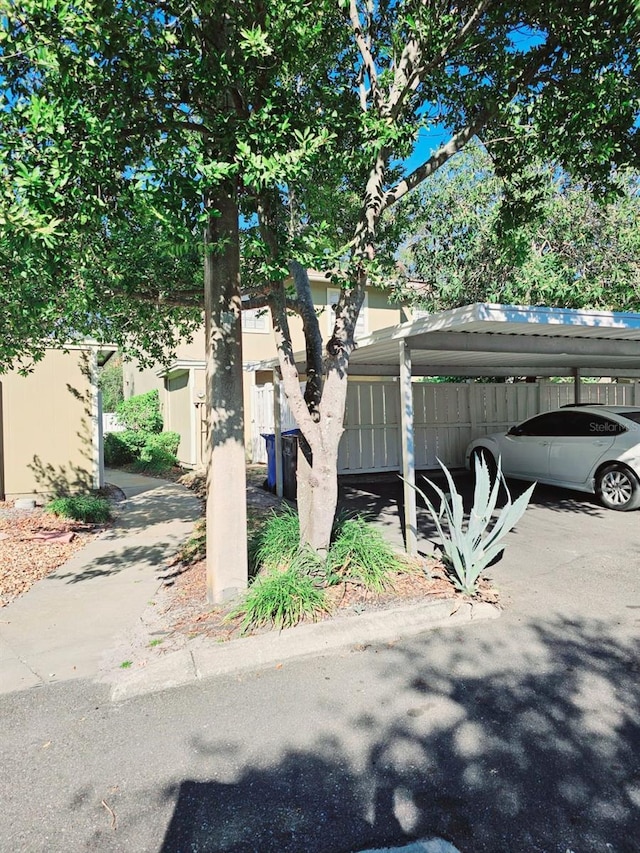 view of home's exterior with a carport