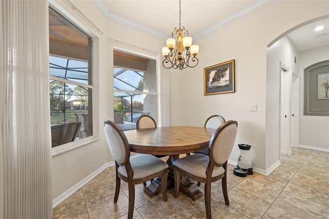 dining area featuring ornamental molding, light tile patterned floors, and an inviting chandelier