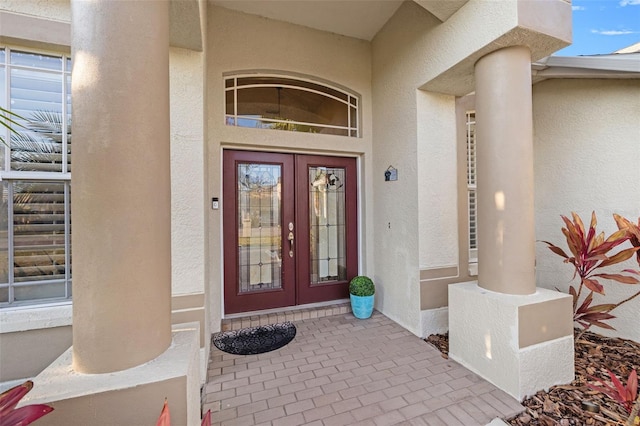 property entrance featuring french doors