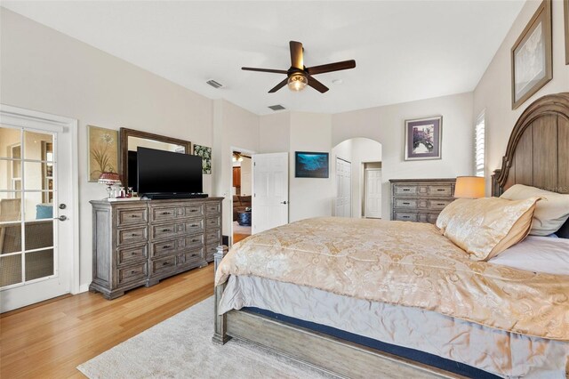 bedroom with ceiling fan and light wood-type flooring