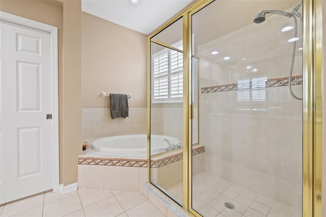 bathroom with plus walk in shower and tile patterned floors