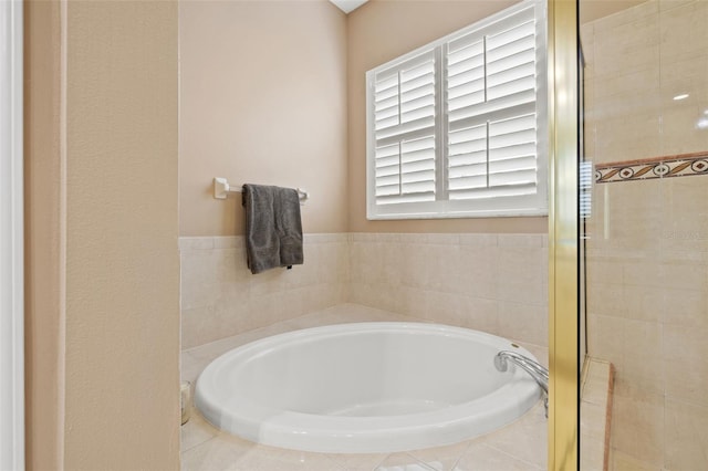 bathroom with tiled bath