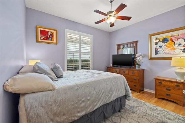 bedroom featuring ceiling fan and light wood-type flooring