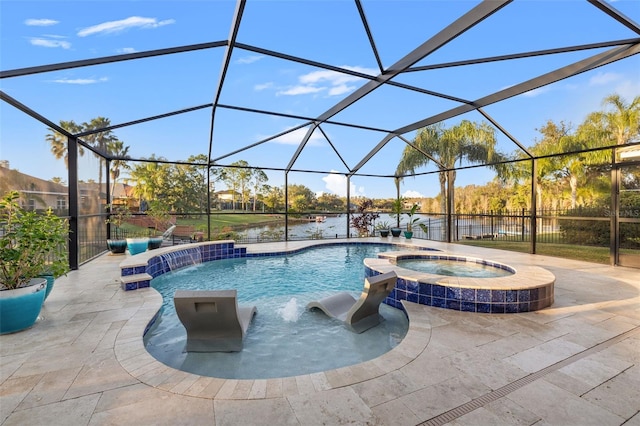 view of swimming pool featuring an in ground hot tub, pool water feature, a lanai, and a patio