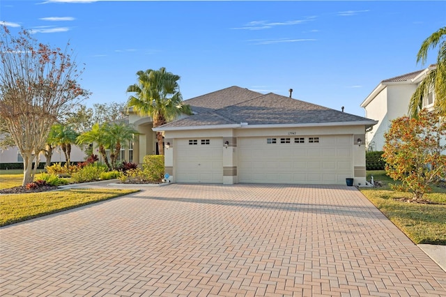 view of front of property with a garage