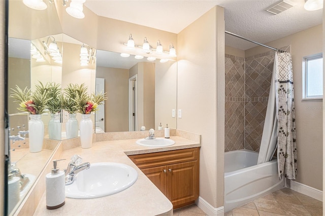 bathroom with shower / tub combo, vanity, and tile patterned floors