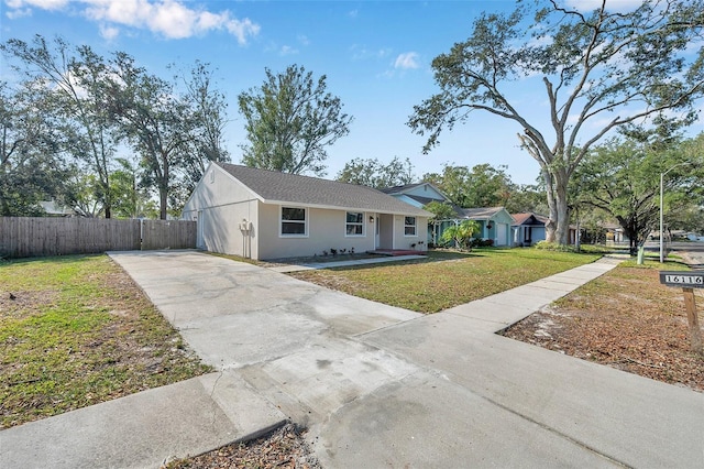 ranch-style home with a front yard