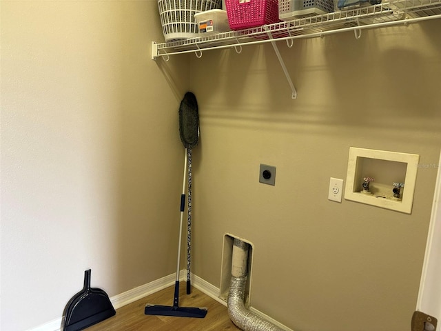 washroom featuring washer hookup, hardwood / wood-style flooring, and electric dryer hookup