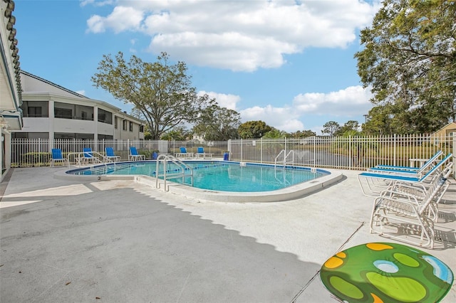 view of pool featuring a patio area