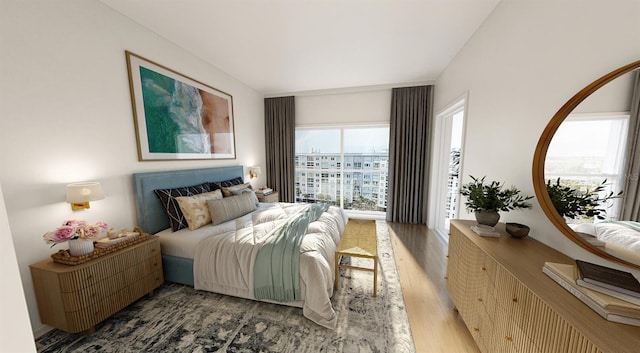 bedroom with hardwood / wood-style floors