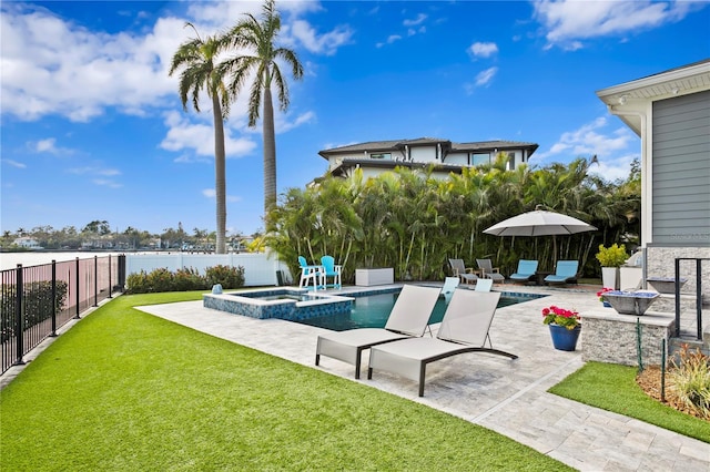 view of swimming pool with a lawn, an in ground hot tub, a water view, and a patio