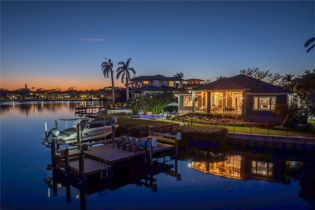 dock area featuring a water view