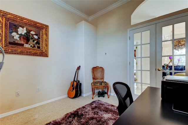 carpeted home office featuring crown molding and french doors