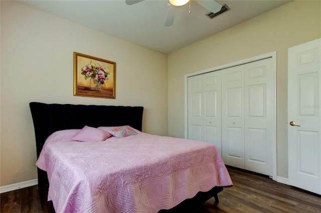 bedroom featuring ceiling fan, a closet, and dark hardwood / wood-style floors