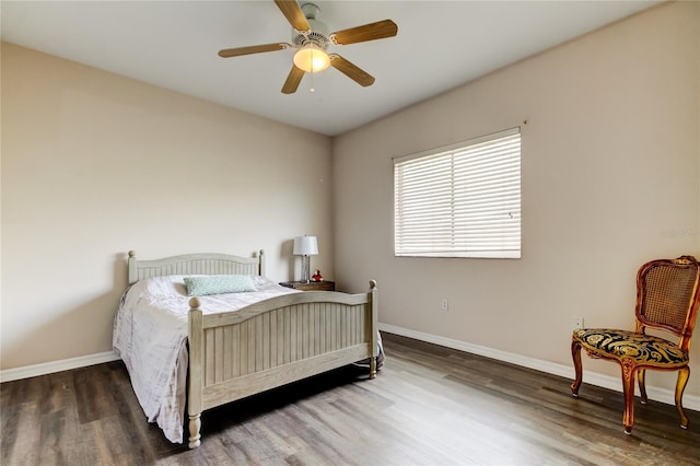 bedroom featuring dark hardwood / wood-style floors and ceiling fan