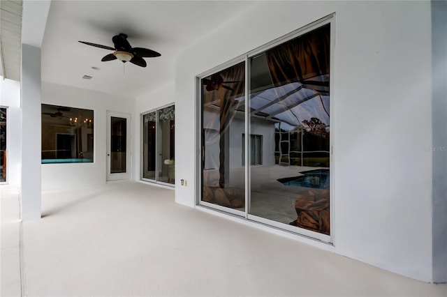 view of patio featuring ceiling fan