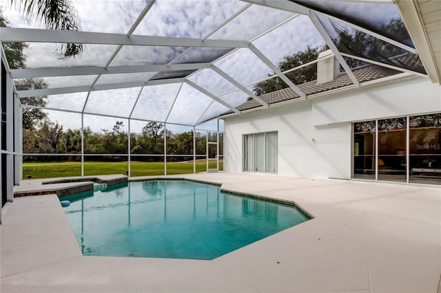 view of pool with a lanai and a patio area