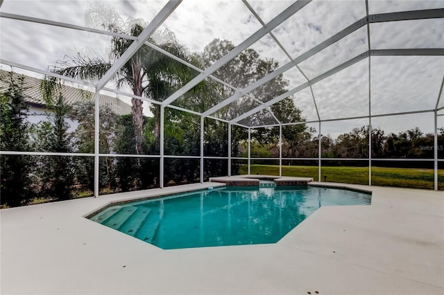 view of pool featuring a lanai and a patio area