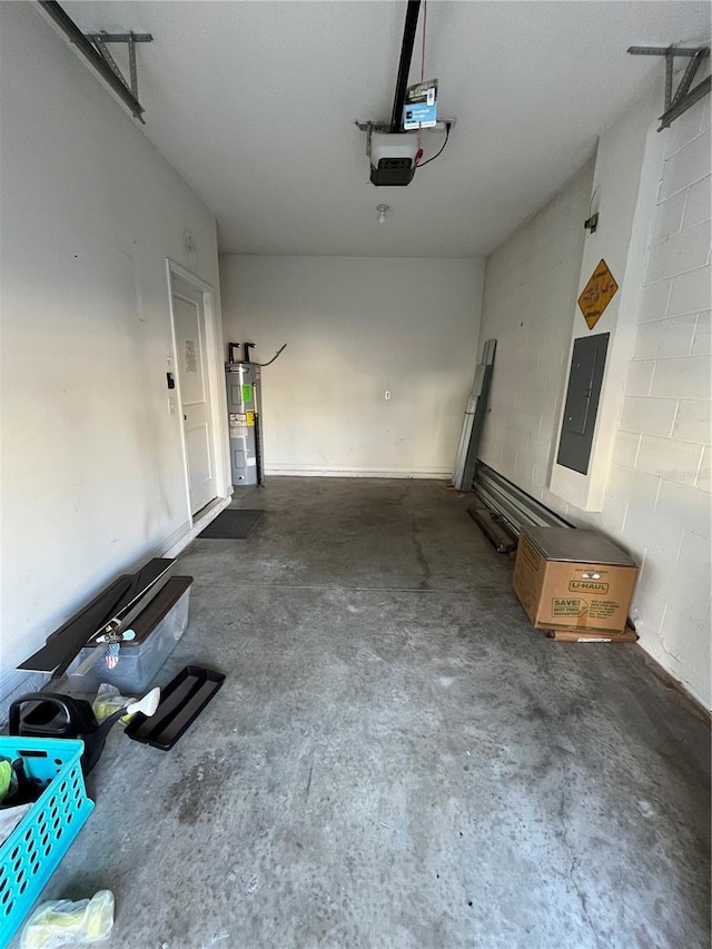 garage with a garage door opener, electric panel, and water heater