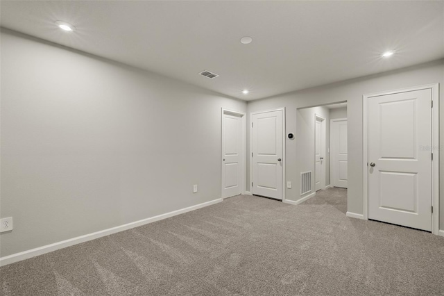 unfurnished bedroom with light carpet