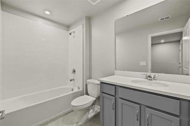 full bathroom with shower / tub combination, vanity, tile patterned floors, and toilet