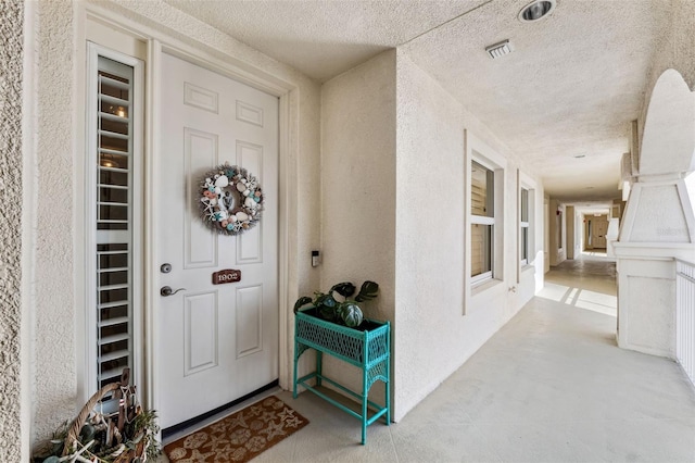 entrance to property with visible vents