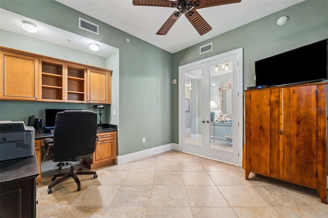 office featuring french doors, a ceiling fan, visible vents, and baseboards