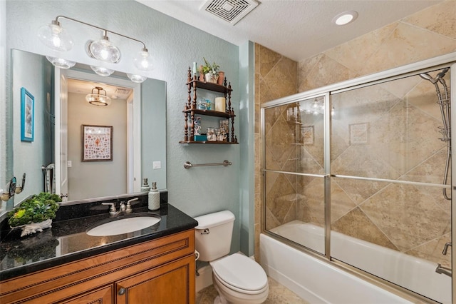 full bath with enclosed tub / shower combo, a textured wall, toilet, vanity, and visible vents