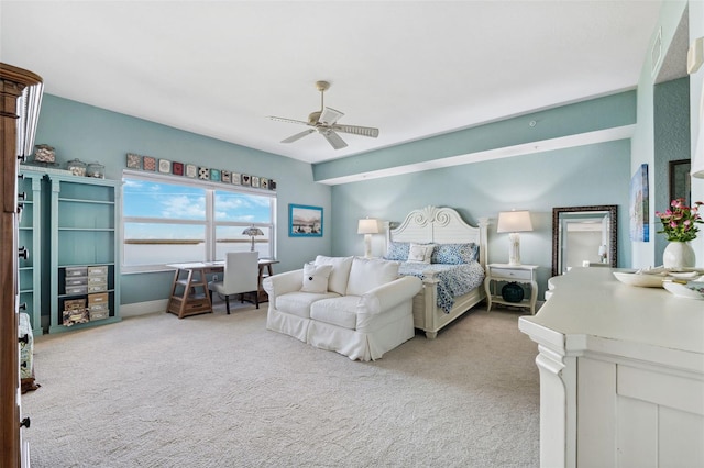 carpeted bedroom with a ceiling fan