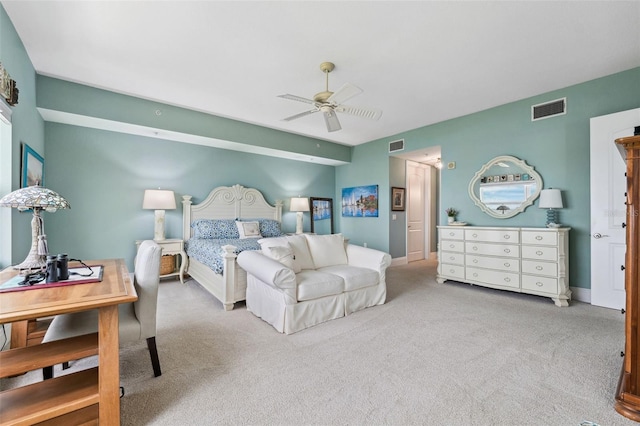 bedroom featuring a ceiling fan, baseboards, visible vents, and carpet flooring